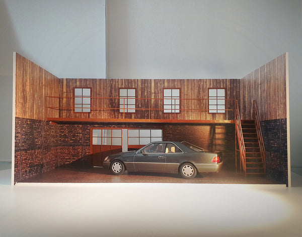Two-story diorama garage kit for 1:18 scale cars with stairs and second floor.