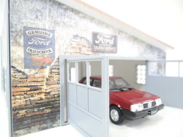 Model of a garage with a red car inside, featuring Ford signage.