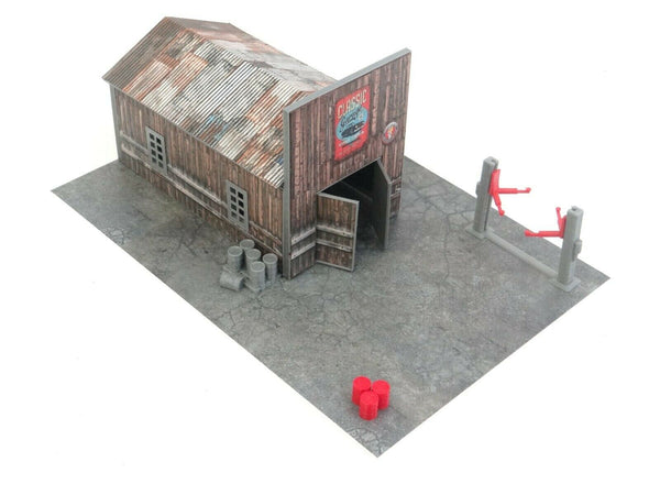 1:60 miniature garage display with lifter, barrels, and pallet for model cars