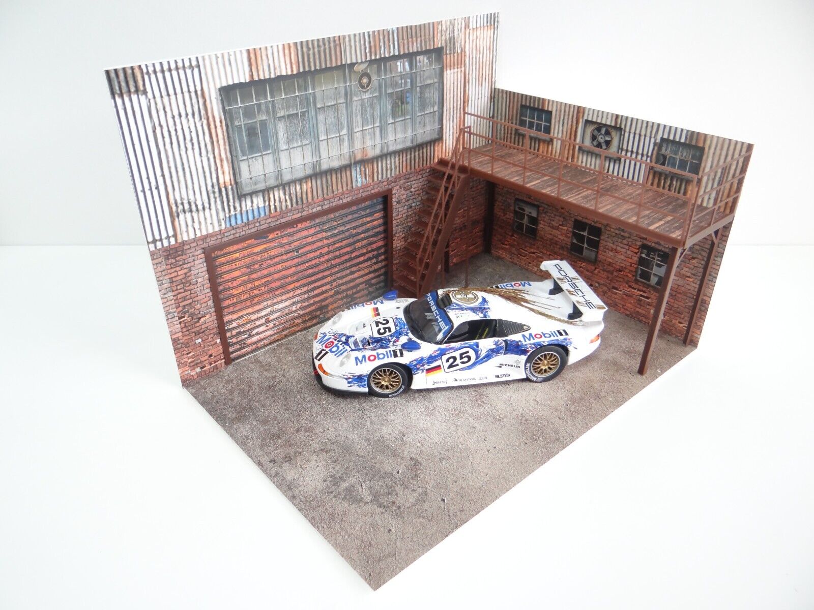 Old ''brick'' and ''metal sheet'' garage Model car display