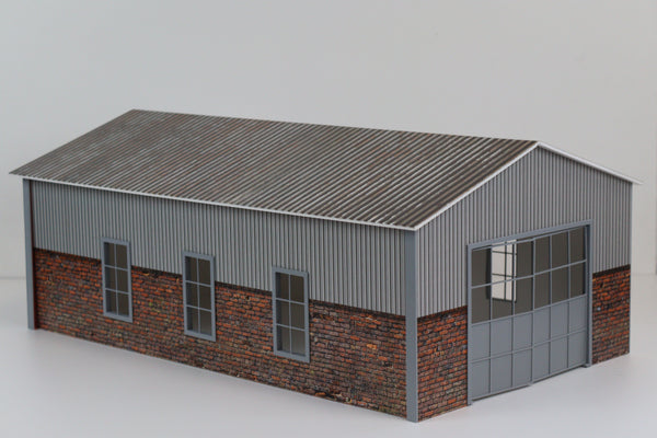 Complete, easy to assemble 1:18 scale hangar diorama set.