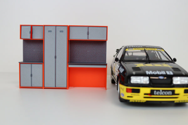 Orange and grey model garage tool storage with pegboard design