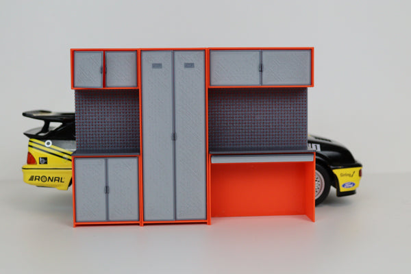 Miniature workshop storage unit with drawers and cupboards in orange and grey