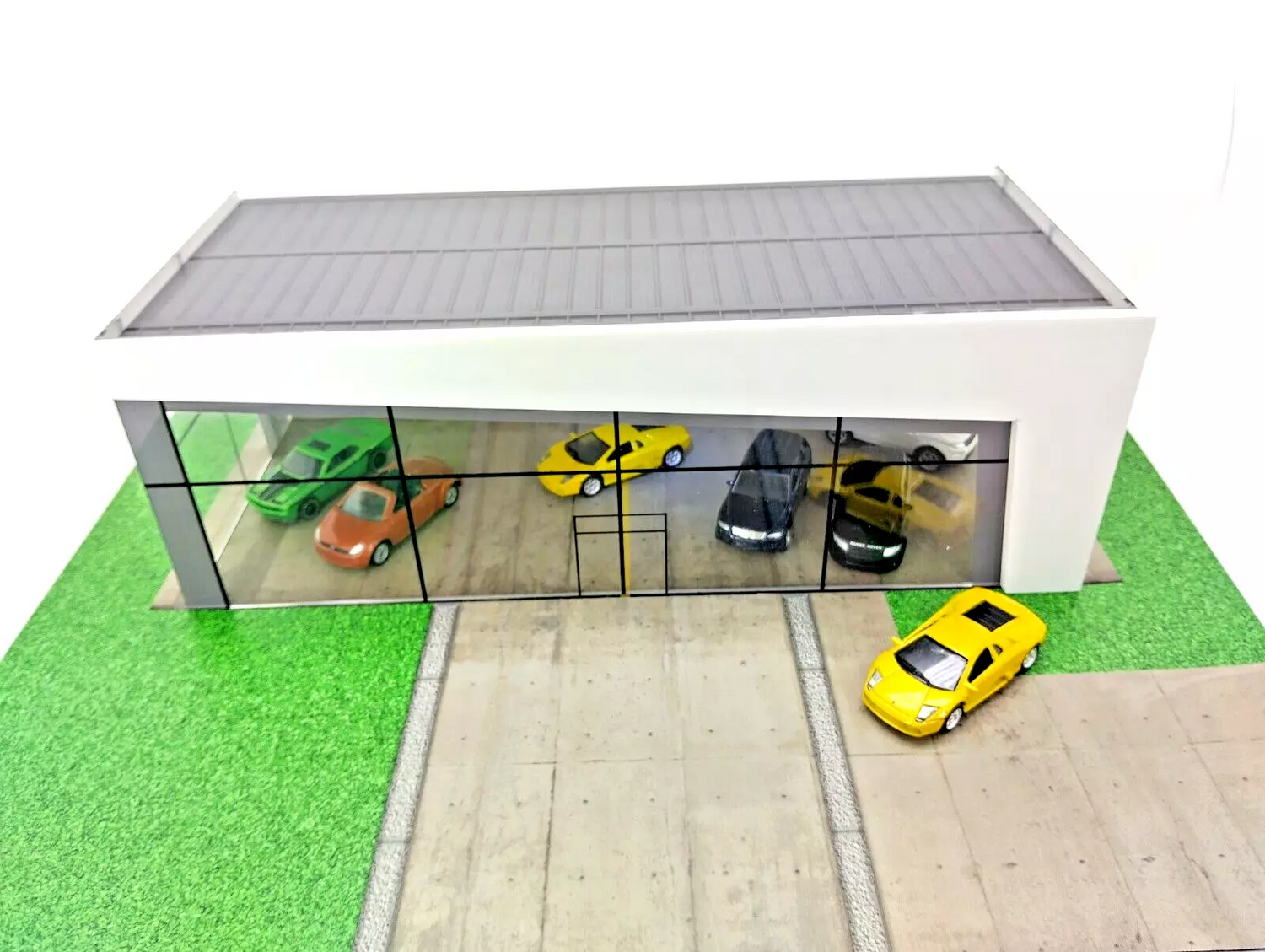 Top-down view showing parking area and diorama layout