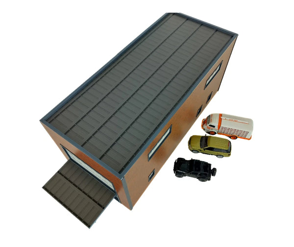 Model of a dock with a ramp and small toy cars on a white background