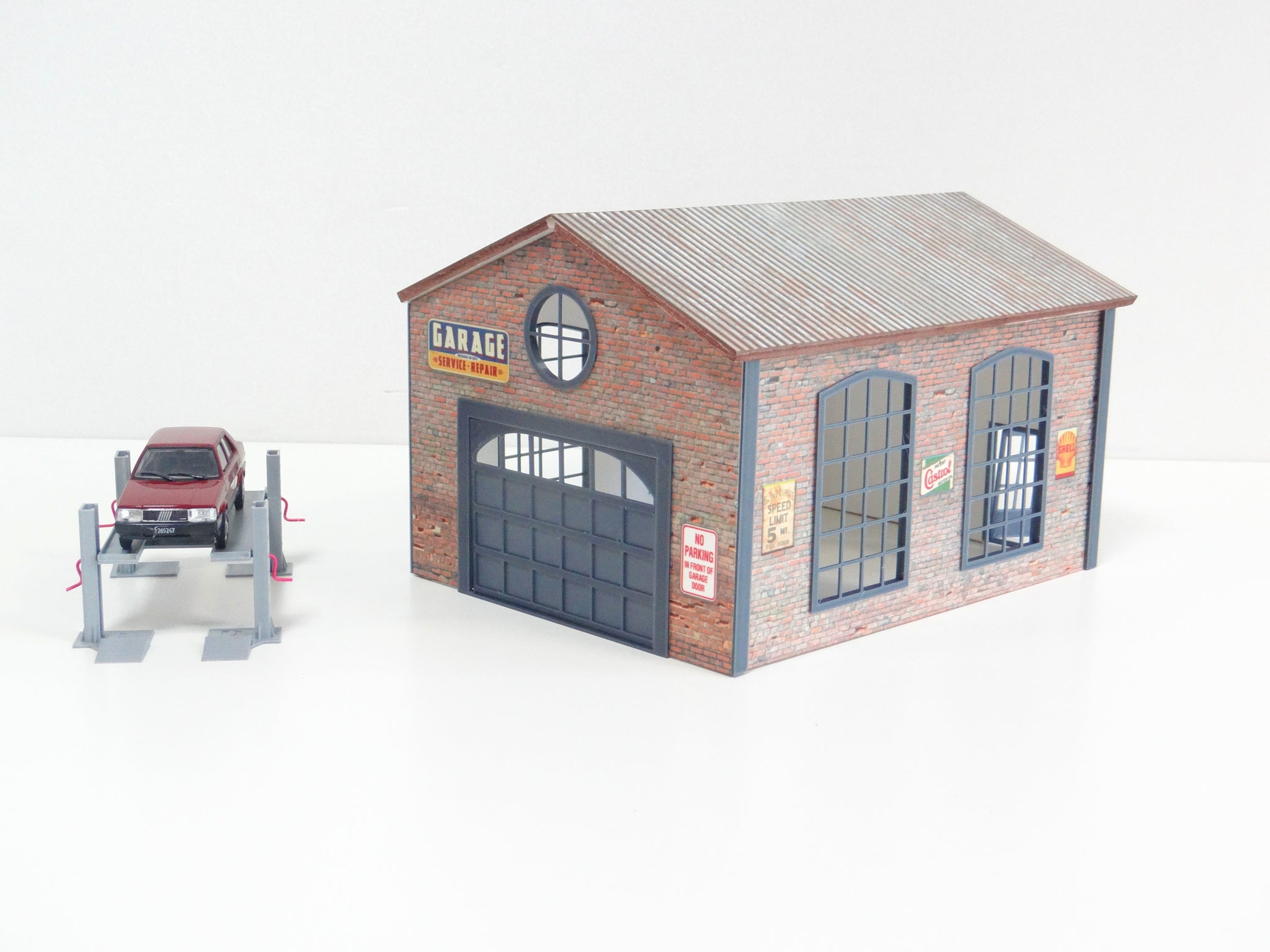 diorama brick garage with car model lifter