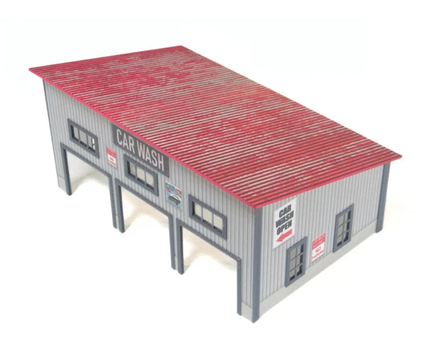 Model car wash building with red roof on a white background 1/64 scale