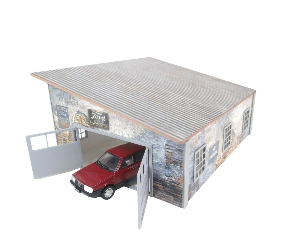 Model of a rustic-style garage with a red car inside on a white background