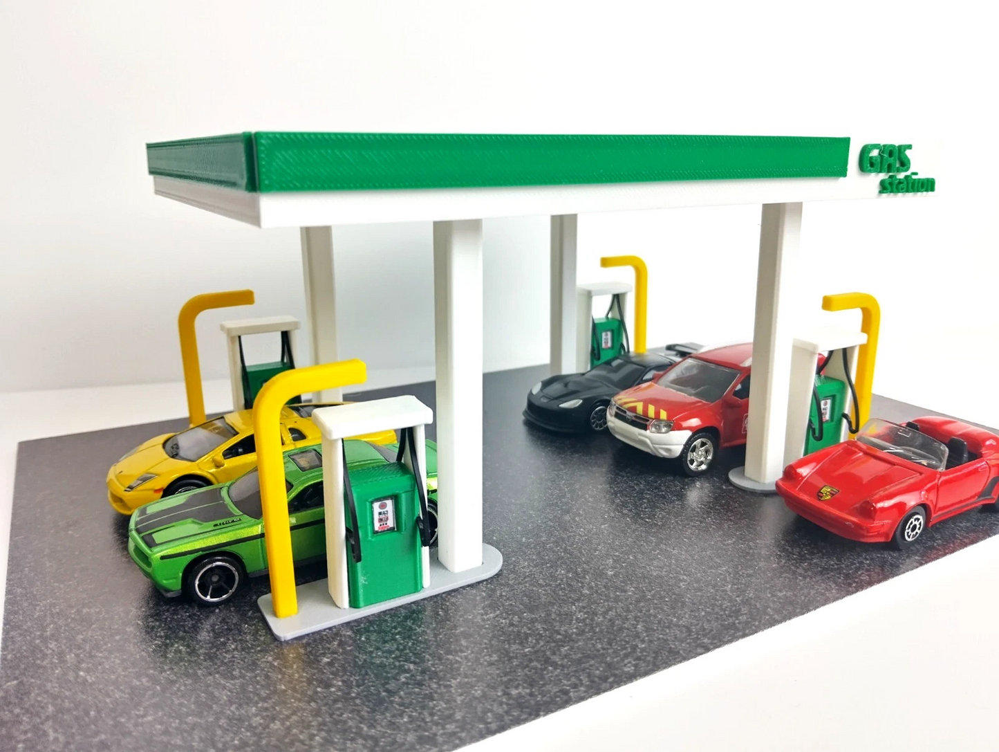 A gas station diorama made of PVC and plastic