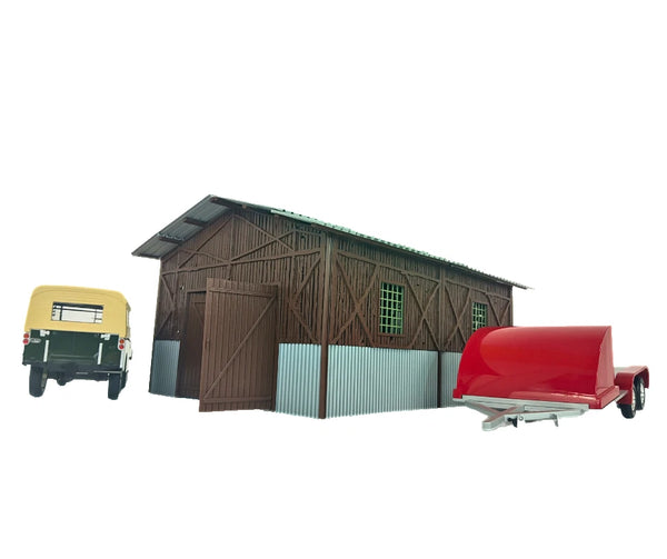 Wooden shed with a yellow car and red trailer on a white background