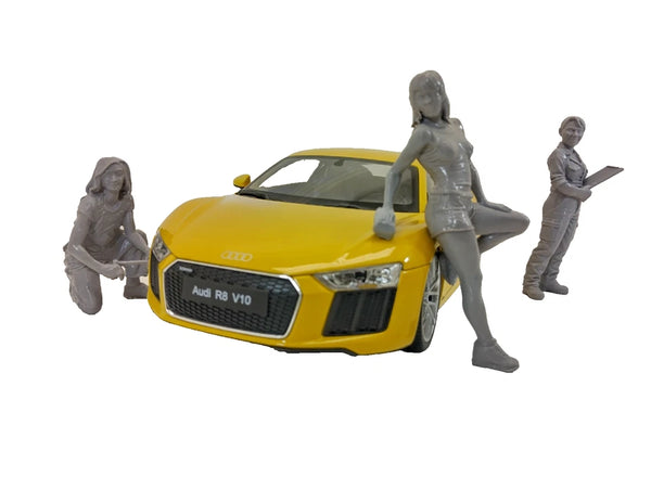 Miniature garage scene with female mechanic figure