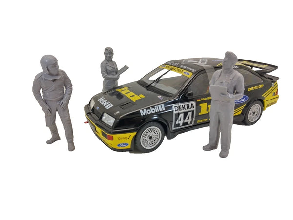 three gray figures on a white background