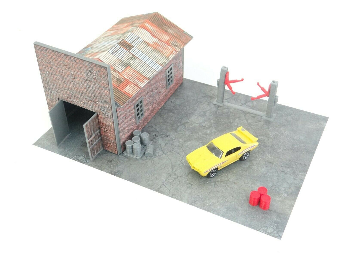 Side view of garage diorama showing functional doors and windows