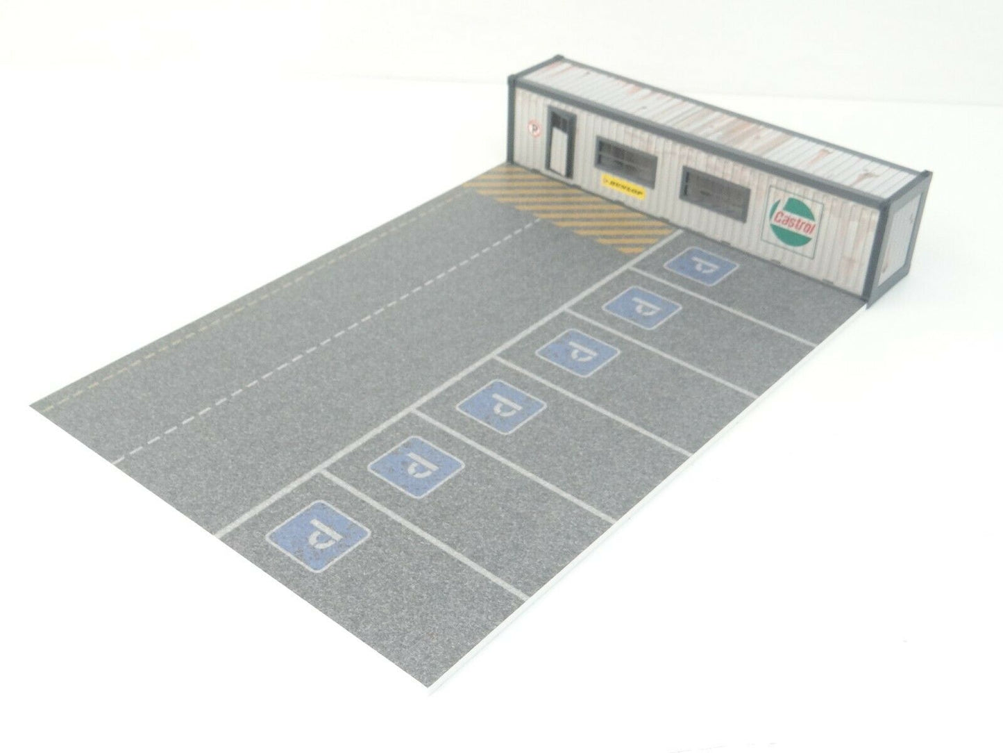 1:43 scale model car display with office container and parking lot